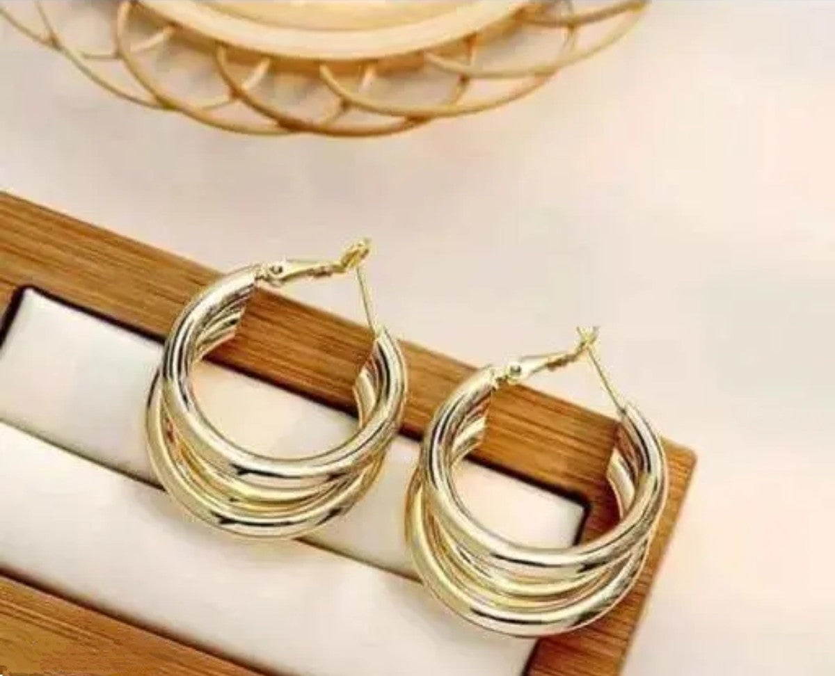 Gold hoop earing