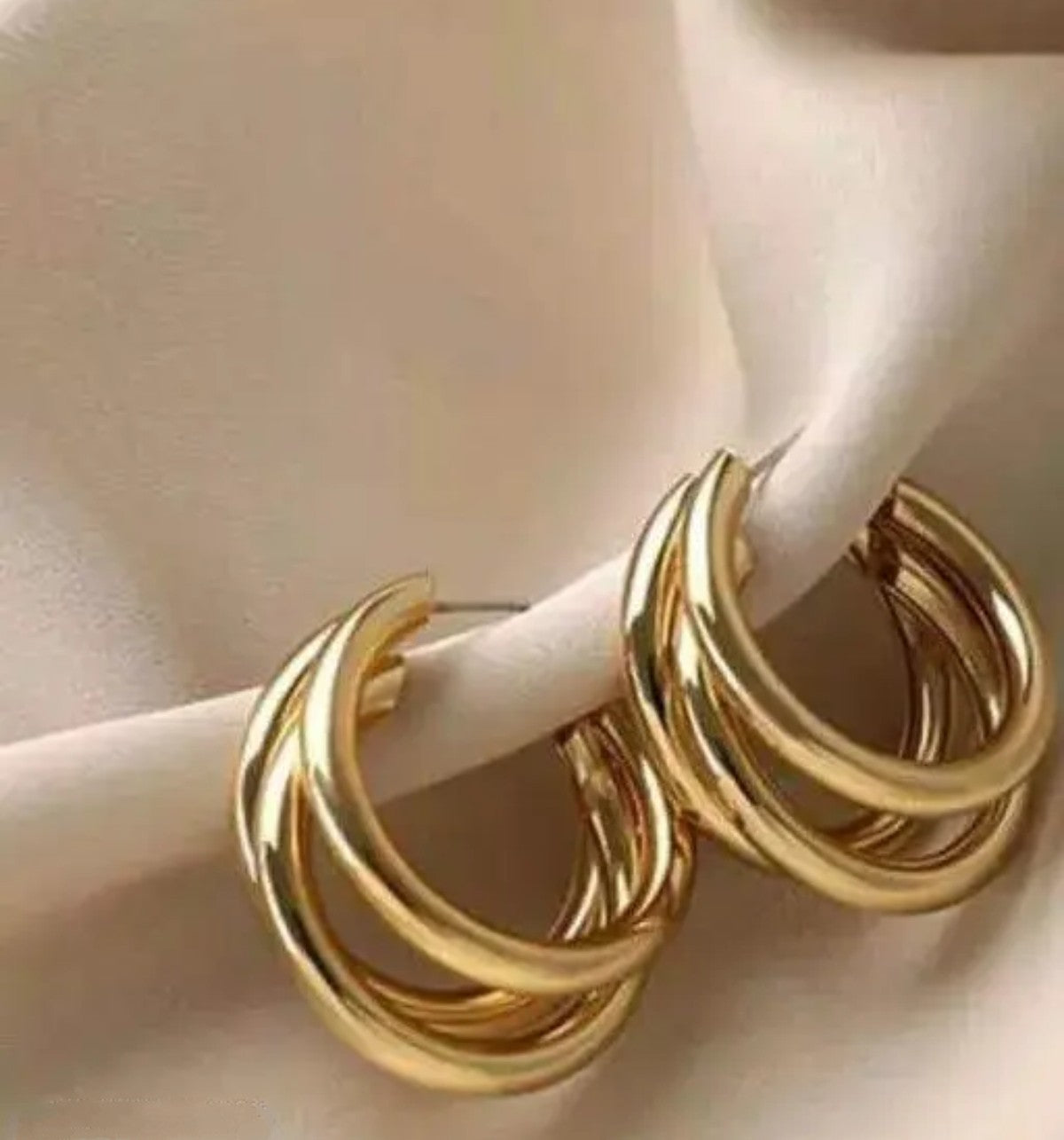 Gold hoop earing